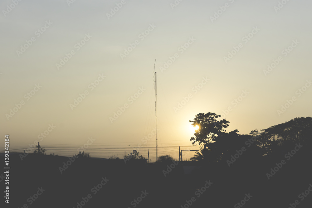 Naklejka premium Silhouette of dwellings and sky day.