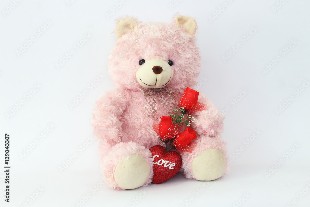 Teddy bears, pink and red roses on a white background.