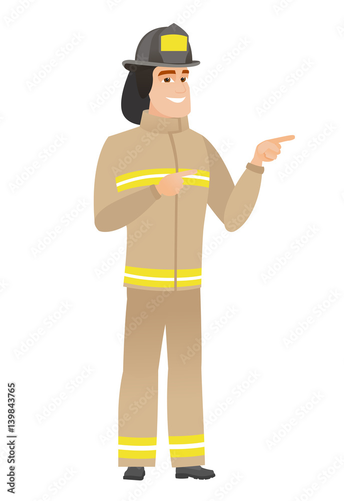 Young caucasian firefighter pointing to the side.
