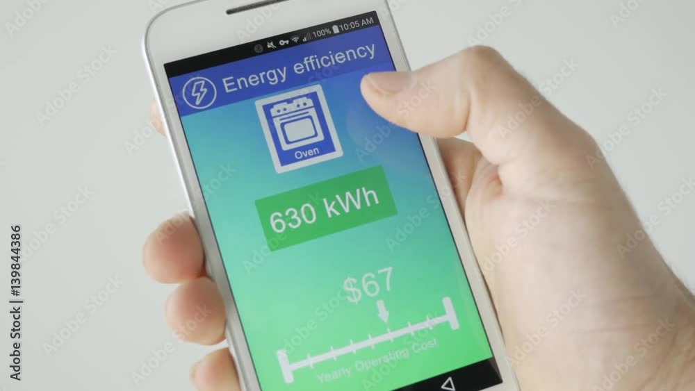 Smart home concept showing the energy efficiency of all the appliances on a smartphone screen. Smart home concept showing the energy efficiency of all the appliances on a smartphone screen.