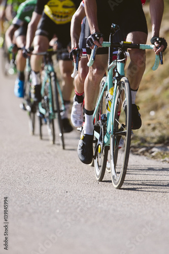 Group of cyclists riding a bike in a cycling race. Racing Bike.