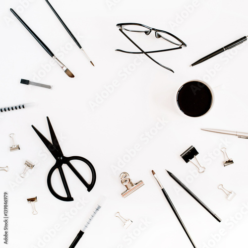 Wallpaper Mural White office desk frame with supplies. Coffee, scissors, pen, clips, glasses and office supplies on white background. Flat lay, top view office table desk. Torontodigital.ca