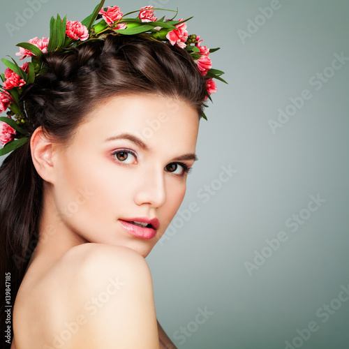 Spa Beauty. Perfect Woman with Healthy Skin and Flowers. Aesthetic Medicine and Cosmetology Concept