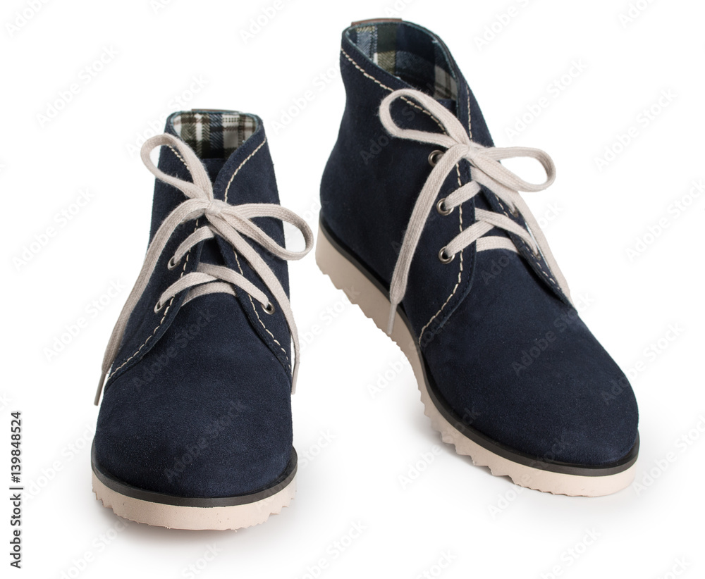 Pair of dark blue womens sport shoes, sneakers isolated on a white background. Pair of dark blue womens sport shoes, sneakers isolated on a white background.