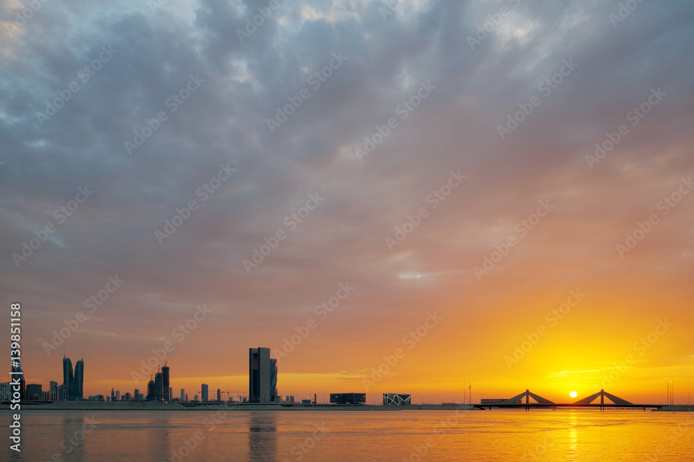 Bahrain skyline line and dramatic skyline during sunset