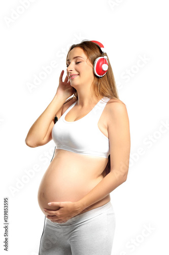 Young pregnant woman with h...