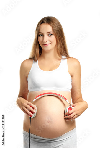 Young pregnant woman with h...
