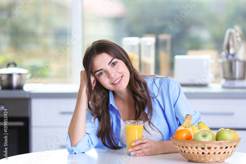 Beautiful young woman with ...
