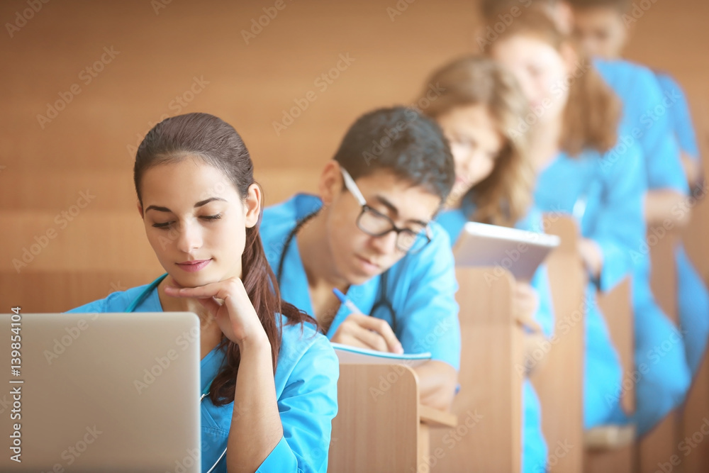 Smart medical students at lecture indoors Smart medical students at lecture indoors