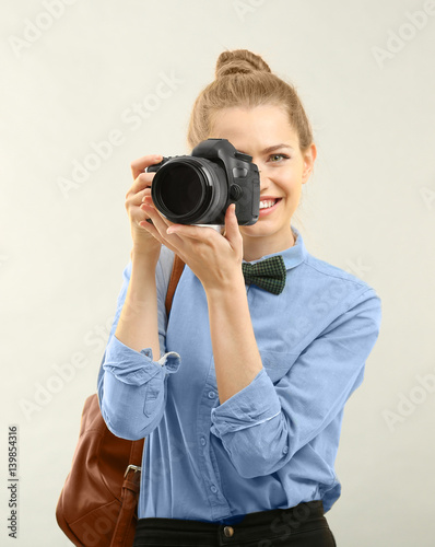 Beautiful female tourist wi...