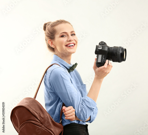 Beautiful female tourist wi...