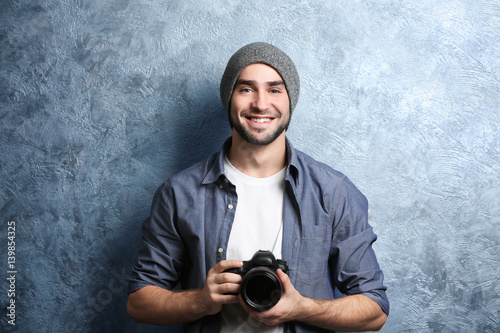 Handsome young photographer...
