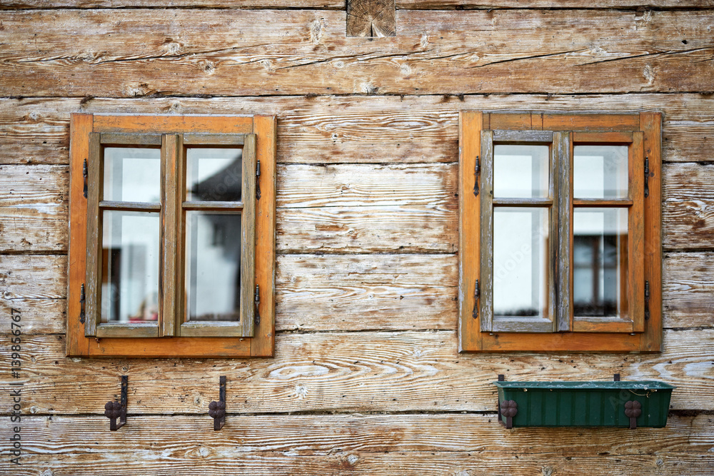 Old windows in antique house building