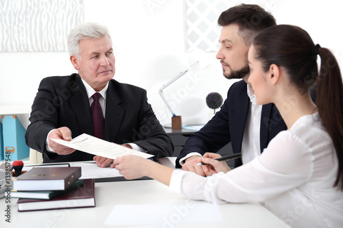 Young couple at notary public office