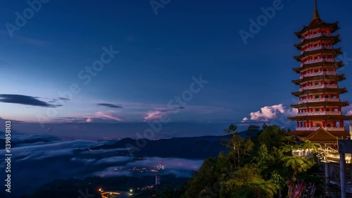 Time Lapse - Sunrise at Chin Swee Caves Temple, Genting Highlands, Malaysia. photo