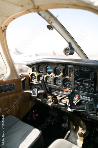 Fototapeta Naklejka Na Ścianę i Meble -  The flight deck and cockpit of a small Piper aircraft