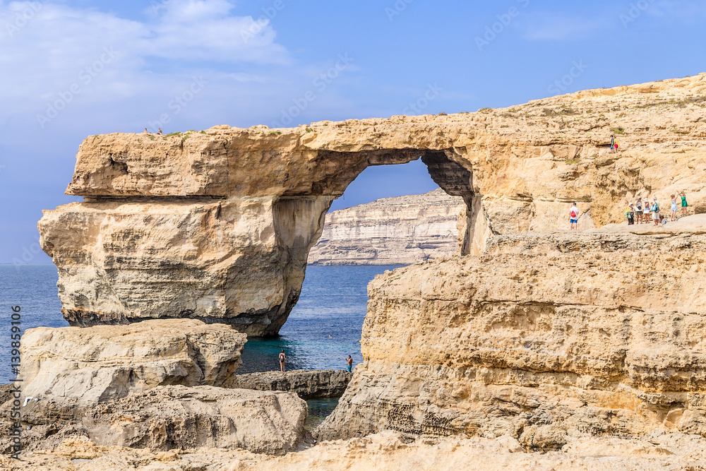 The island of Gozo, Malta. The Azure Window, a UNESCO World Heritage Site, and adjacent cliffs