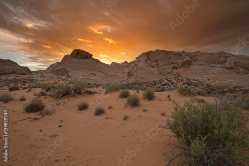 Sun setting behind mountain at Valley of Fire State Park