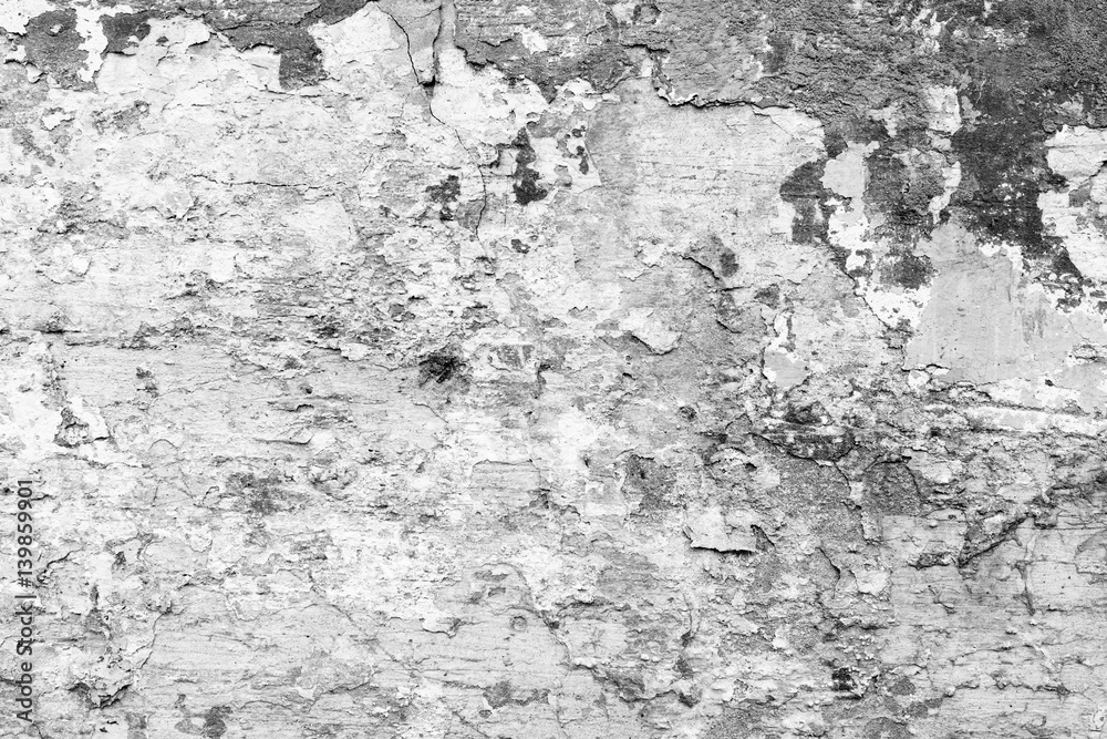 Fototapeta premium Wall fragment with scratches and cracks