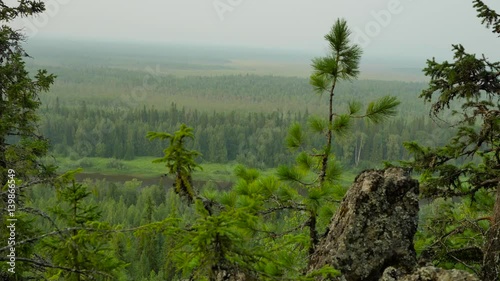 panorama from top hill to ural mountains photo