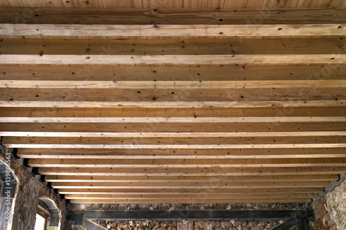 Reconstruction of old ruined house in Dubrovnik, Croatia. Changing decrepit floor and ceiling with new beam and timber.