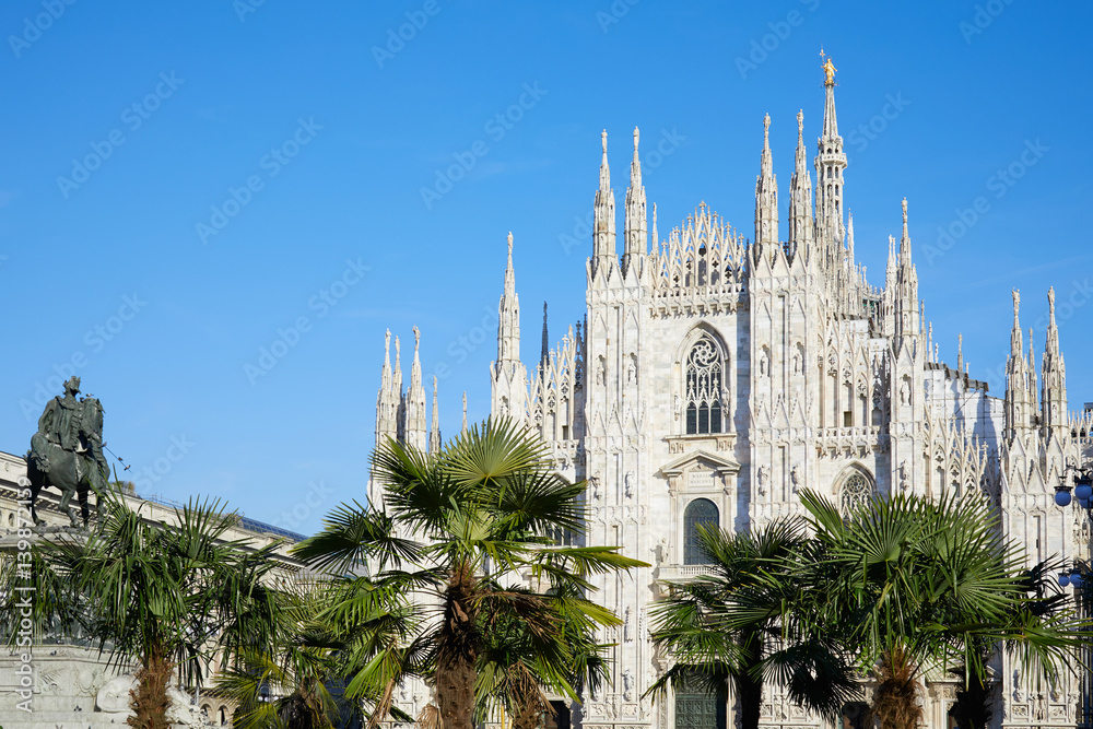 Milan Duomo cathedral with palm trees