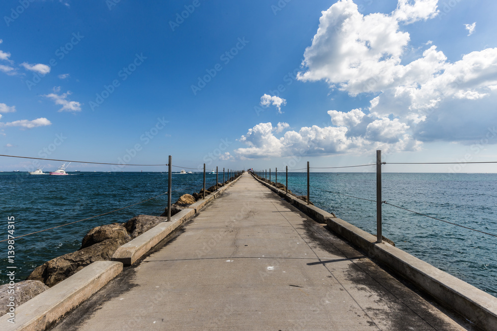 Blue sky and 900-foot fishing jetty