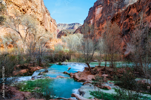 The Colorado River flowing through the Havasupai Canyon,in Supai, AZ, looks blue green due to the chemical composition of the rocks.