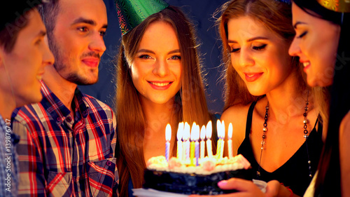 Canvas Print Happy friends birthday celebrating food with candle celebration cakes in club