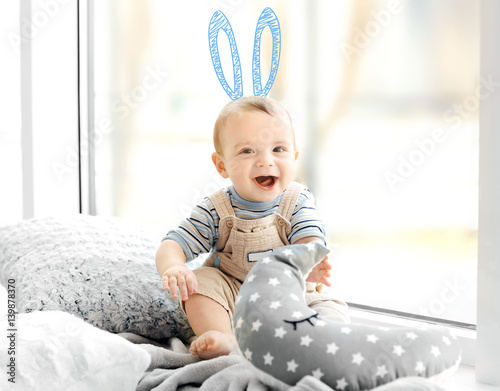 Little baby boy with pillow...