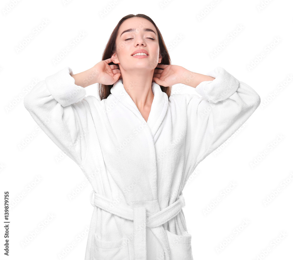 Beautiful young woman in bathrobe on white background Beautiful young woman in bathrobe on white background