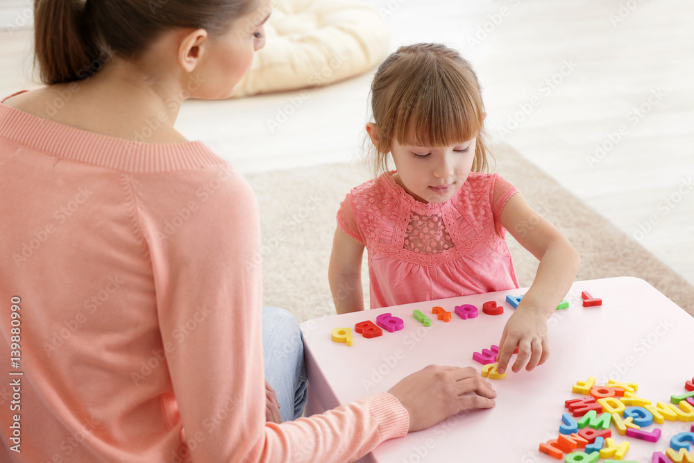Cute little girl at speech therapist office Cute little girl at speech therapist office