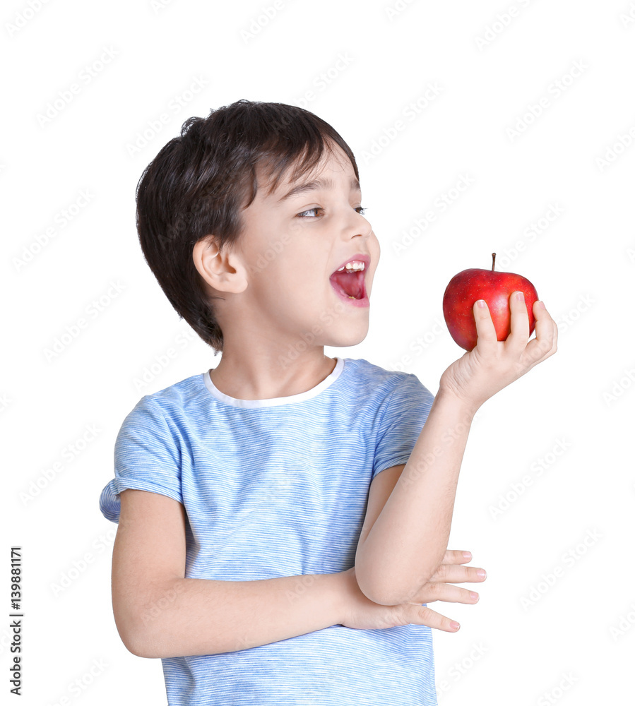 Cute little boy with apple on white background Cute little boy with apple on white background