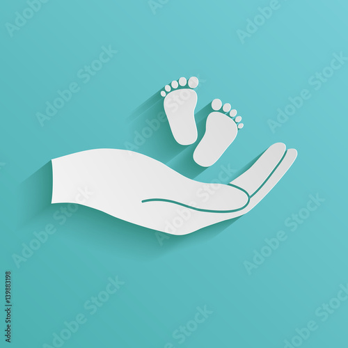 Hands holding baby foot