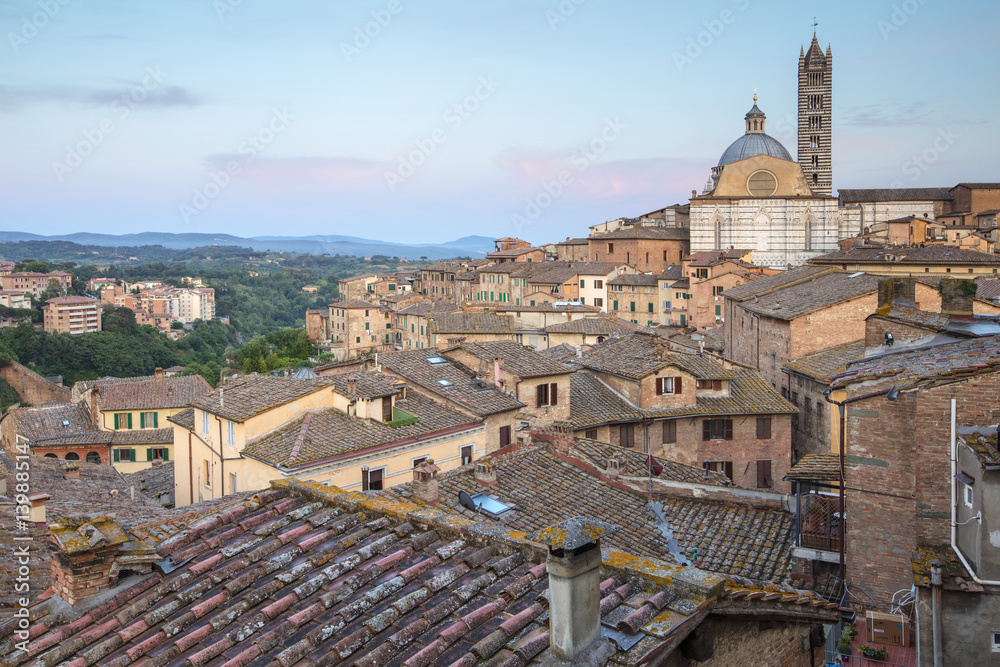 silent morning above the roofs and cathedral  in Siena in Tuscany in Italy