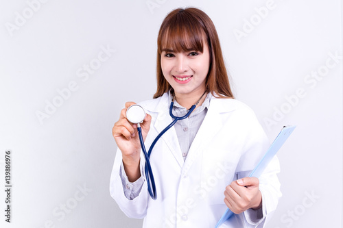 Young Asian female doctor hold a with stethoscope.