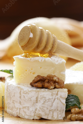 Organic camembert cheese with nuts and pears