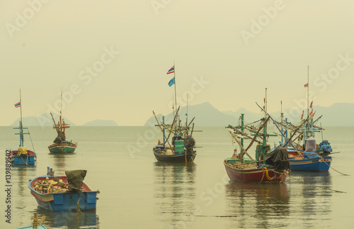 fishing boat with sea sunset