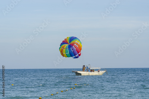 PHUKET, THAILAND -Jul 5 2016: An unidentified Paramania Paramotor show in Children day. Photo at Phuket, Thailand photo