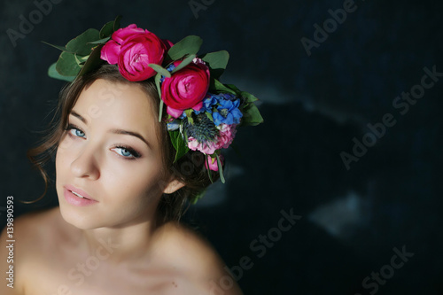 woman face with blue eyes . beauty bride on the dark background