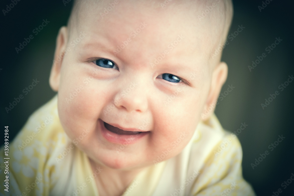 Portrait of crying baby girl.