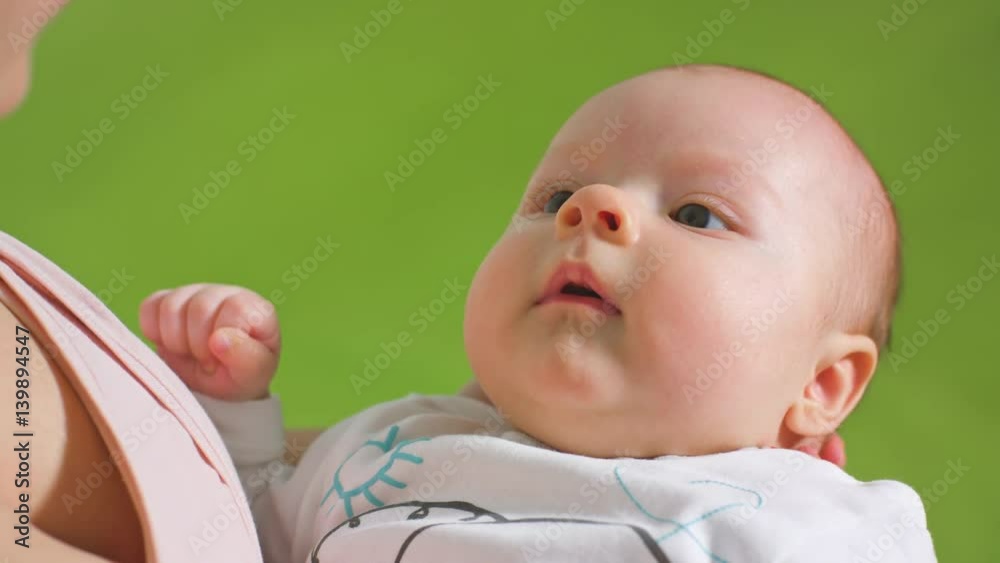 Beautiful baby in her mothers hands Beautiful baby in her mothers hands