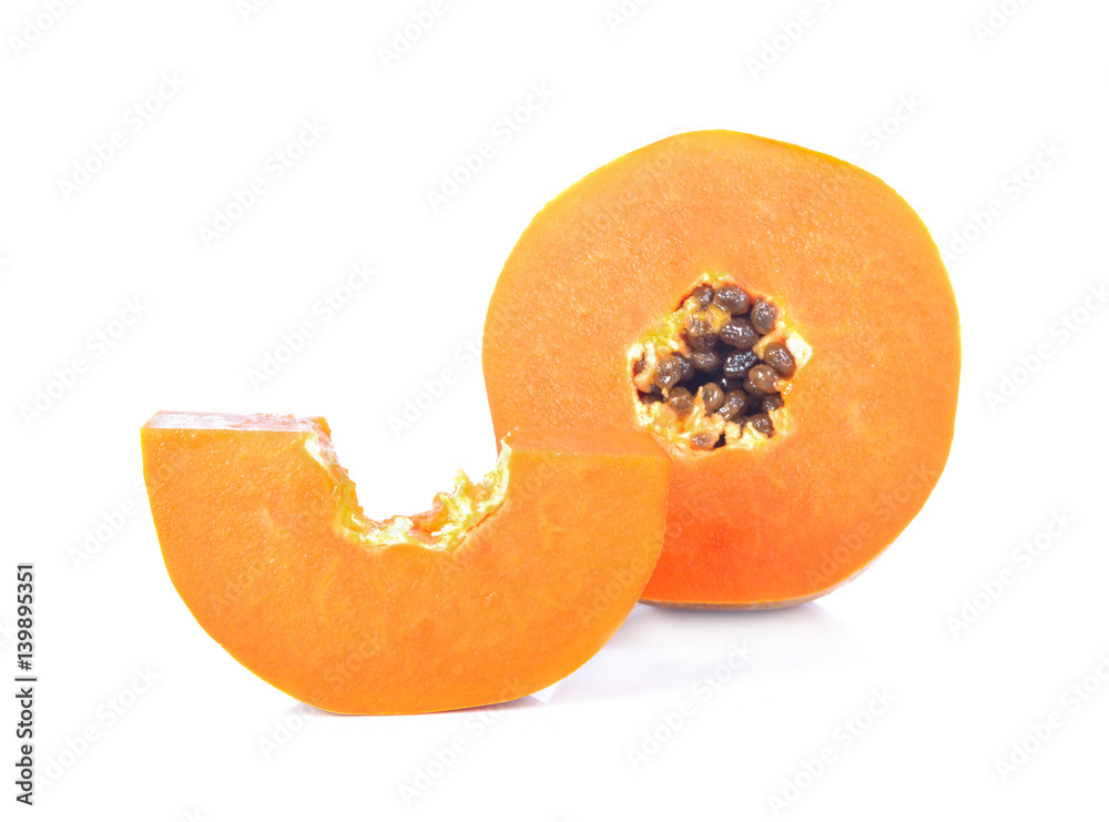 Ripe papaya isolated on white background, cut in half