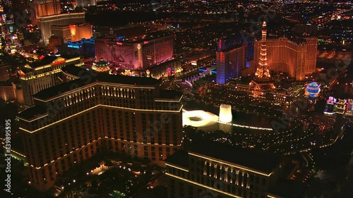 Orbiting the Bellagio and its fountains in Las Vegas at night. Shot in 2008.