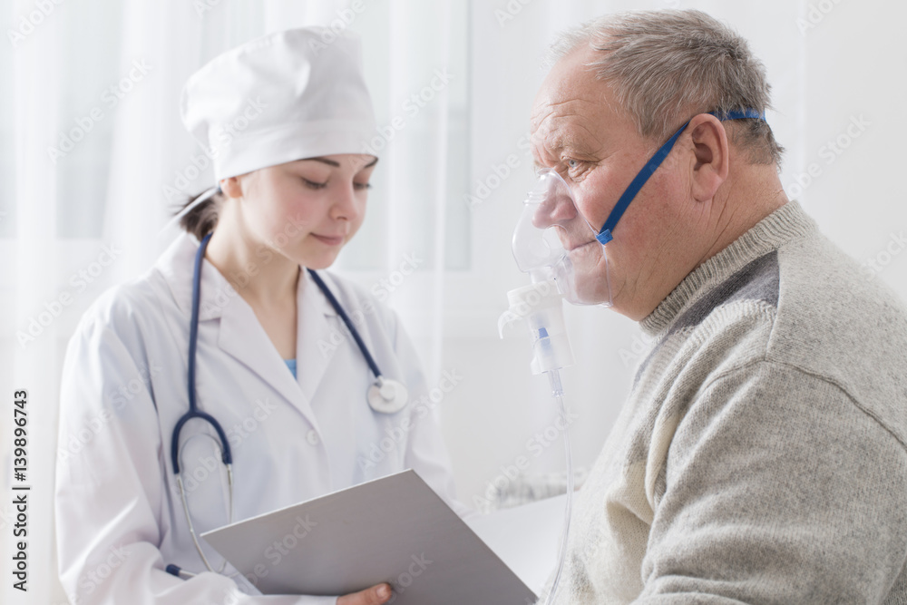 doctor does inhalation elderly man doctor does inhalation elderly man