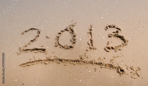 new 2013 year date written in sand