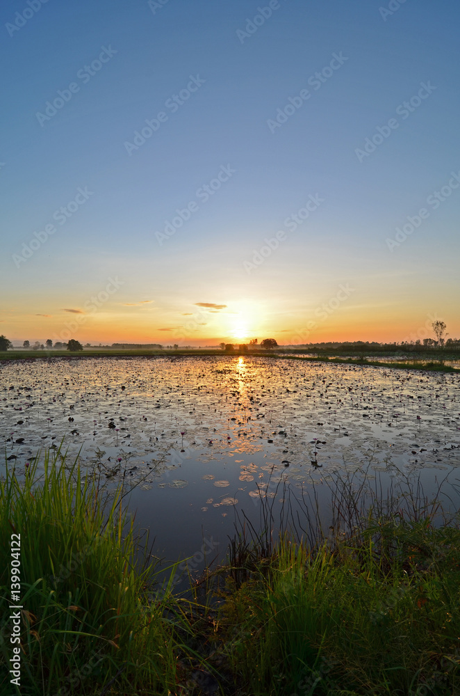 Sunset with beautiful sky on lake, Thailand