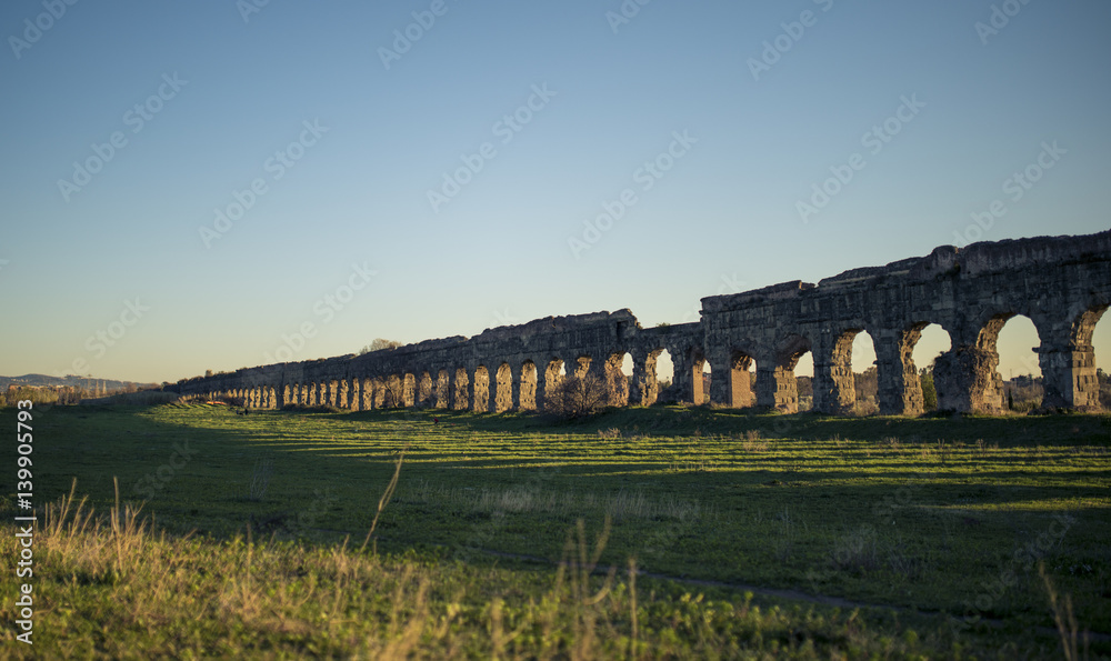 Roman  aqueduct in Rome at sunset