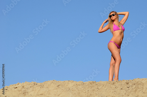 Beautiful young Sexy woman standing in black bikini