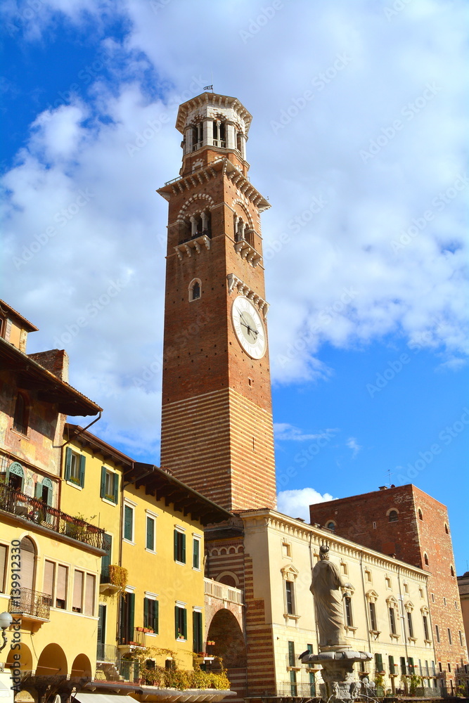 The old medieval tower with the blue sky in Verona called 